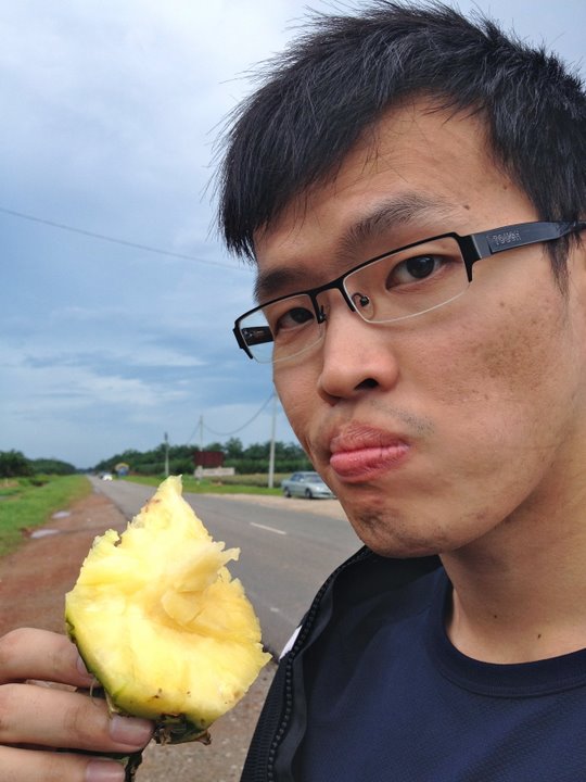Lionel eating pineapple